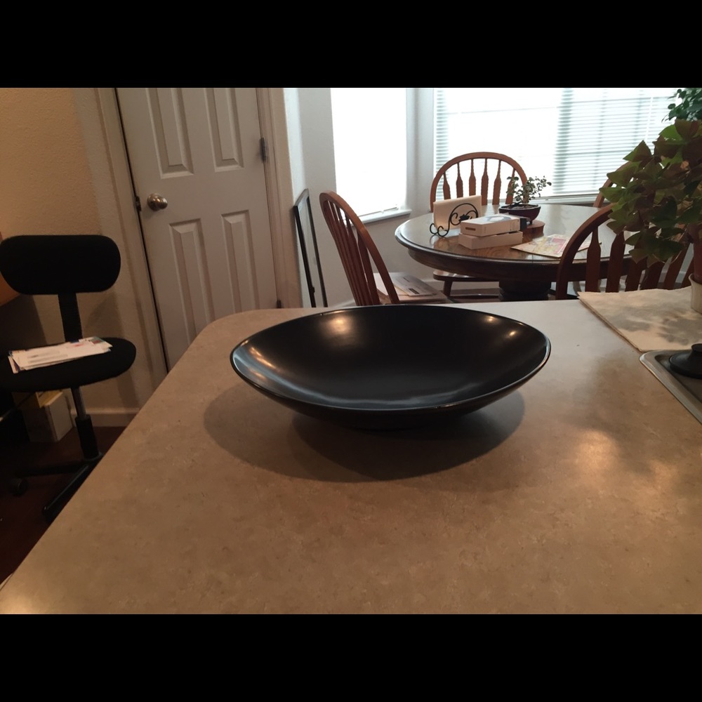 Black world market bowl with fake fruit